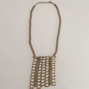 Anthropologie Serafina Statement necklace with brass and white bead tassels